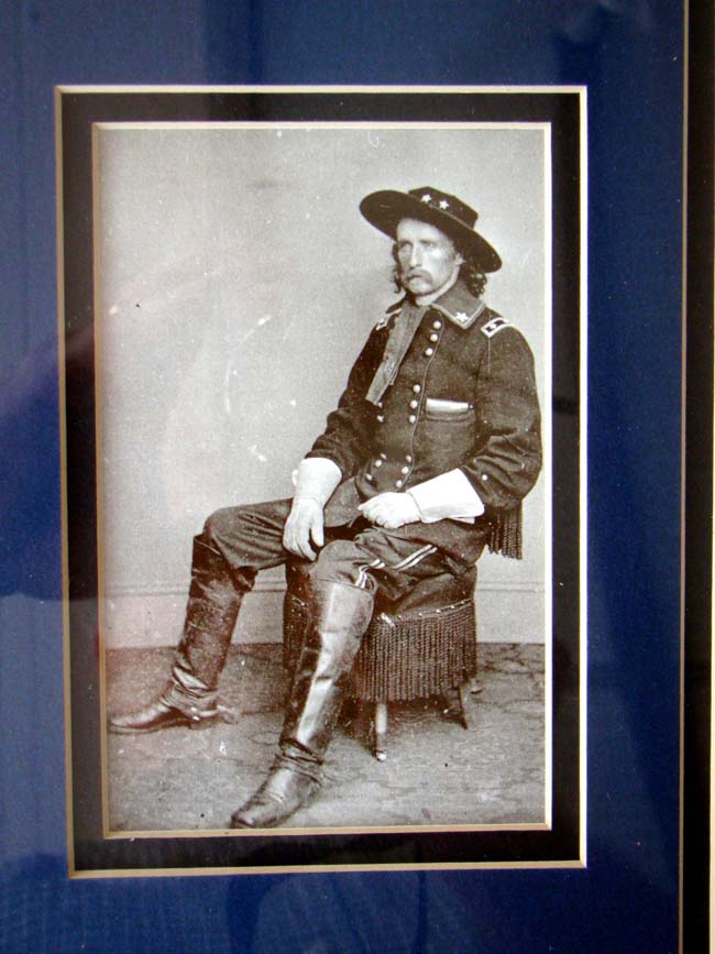 A framed photo of Maj. Gen. George Armstrong Custer taken in March 1865